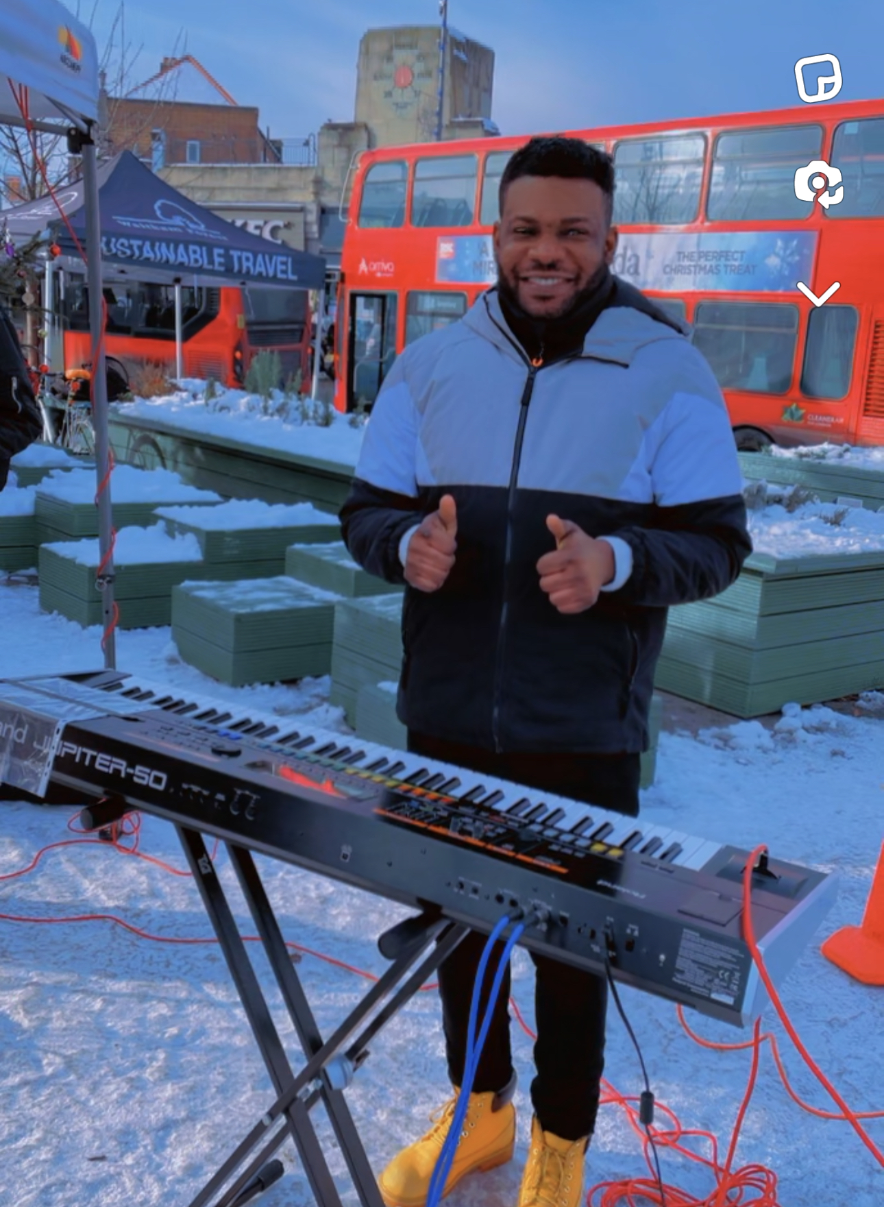 Elys Sorel seated at the piano